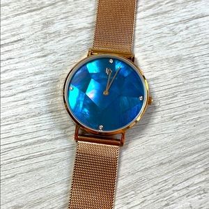 Paul Rich rose gold band ocean blue face watch